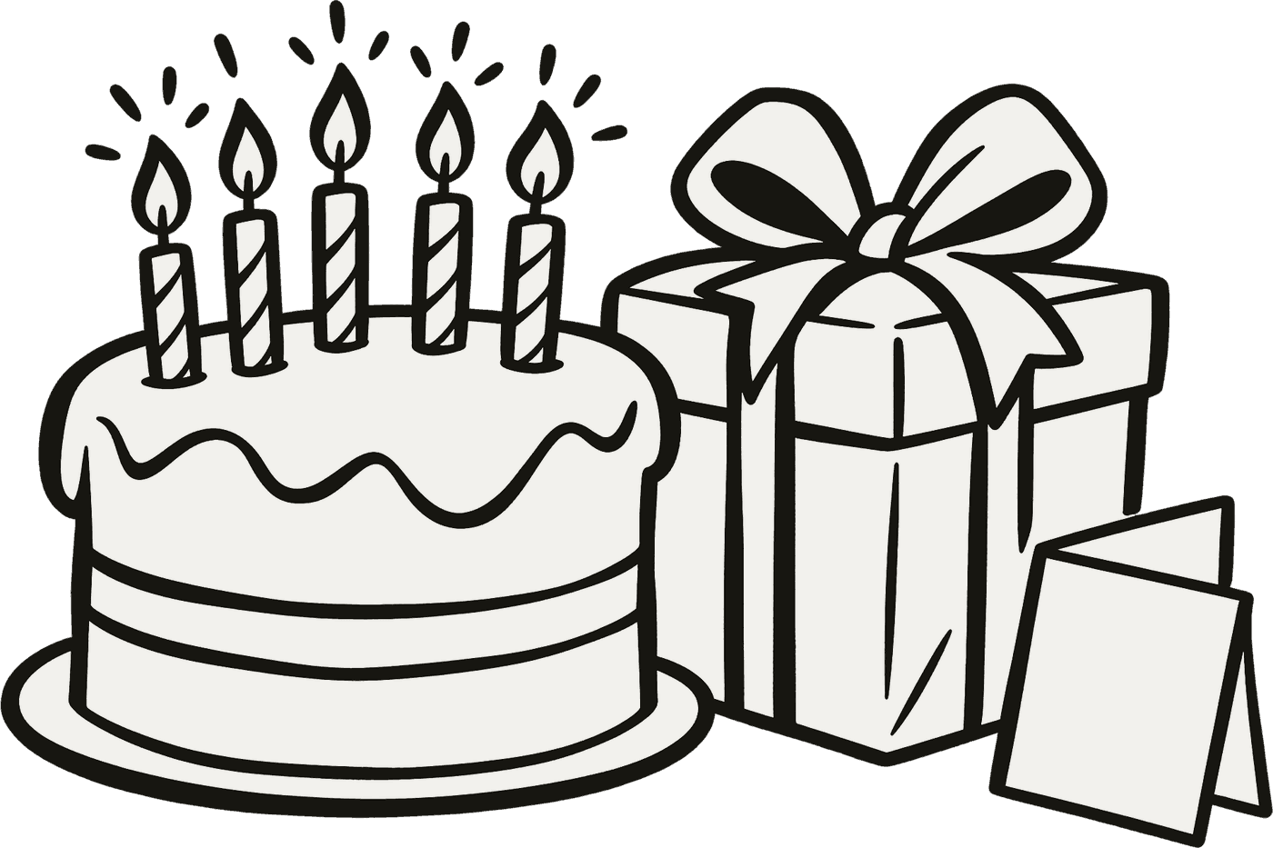 A birthday cake with lit candles beside a wrapped present and a card.